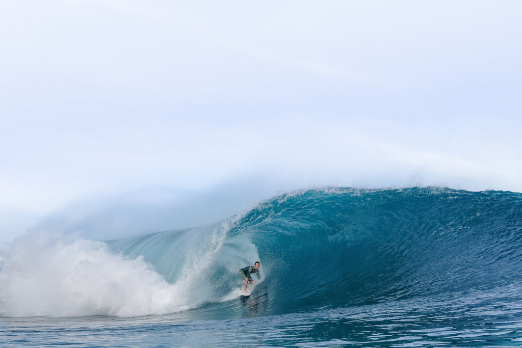 Late Season Swell at Pipe by Henry Cullison