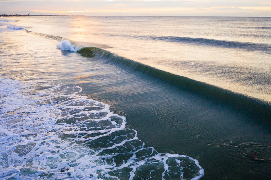 Sunrise Surf Aerial by Cate Brown